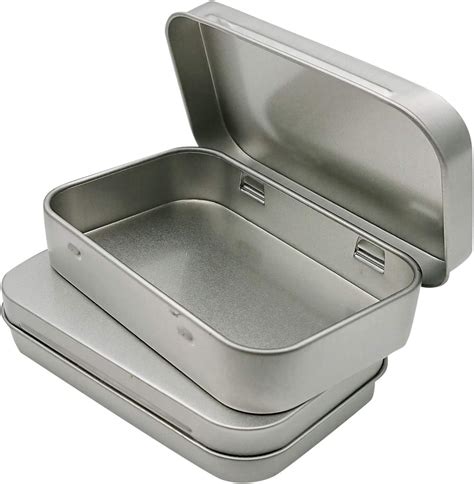 a metal box small|small metal boxes with lids.